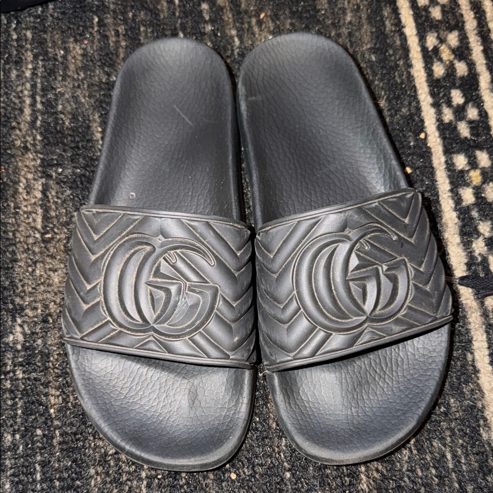 Black Gucci Embossed Slides